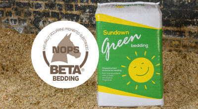 Sundown Green bale of bedding with the BETA NOPS logo next to it