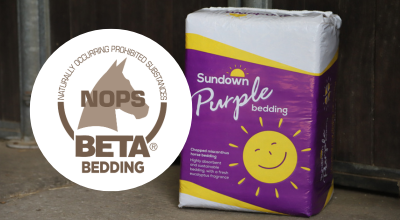 Sundown Purple bale of bedding with the BETA NOPS logo next to it